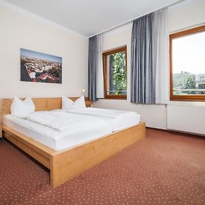 Kamer met een Queen Size Bed